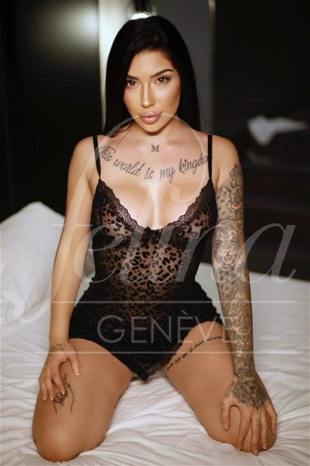 Sweet and affectionate escort in black bodysuit for Girlfriend Experience and GFE in Geneva